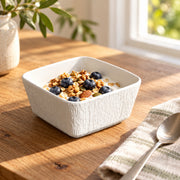 AI-assisted illustration of White Textured Square Bowl, morning yogurt setting; food and styling props are not included.