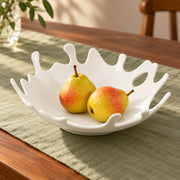 AI-assisted illustration of Coral-Rim White Serving Bowl, pear still life setting; food and styling props are not included.