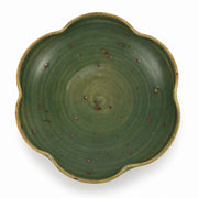 AI-assisted concept image of forest petal serving bowl: overhead view.