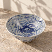 AI-assisted concept image of cobalt blossom conical bowl: styled editorial view; food and props are not included.