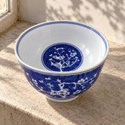 AI-assisted concept image of cobalt plum blossom deep bowl: styled editorial view; food and props are not included.