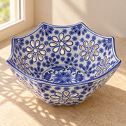 AI-assisted concept image of cobalt octagonal openwork fruit bowl: styled editorial view; food and props are not included.