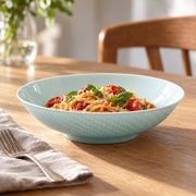 AI-assisted concept image of qingbai grain relief deep plate: styled table view; food and props are not included.