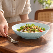 AI-assisted concept image of qingbai grain relief deep plate: styled setting view; food and props are not included.
