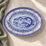 AI-assisted concept image of dragon & rice-grain oval platter: styled editorial view; food and props are not included.
