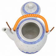 AI-assisted concept image of rice-grain teapot — orange handle: the opened form with its removable components.