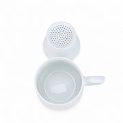 AI-assisted concept image of linglong landscape infuser mug: the opened form with its removable components.