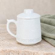 AI-assisted concept image of linglong landscape infuser mug: styled editorial view; food and props are not included.