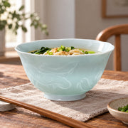 AI-assisted concept image of qingbai lotus noodle bowl: styled table view; food and props are not included.