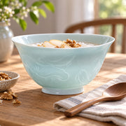 AI-assisted concept image of qingbai lotus noodle bowl: styled setting view; food and props are not included.