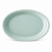 AI-assisted concept image of qingbai oval serving platter: a second view of the form.