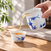 AI-assisted concept image of the Bamboo Linglong serving pitcher pouring tea into an included cup; props are not included.